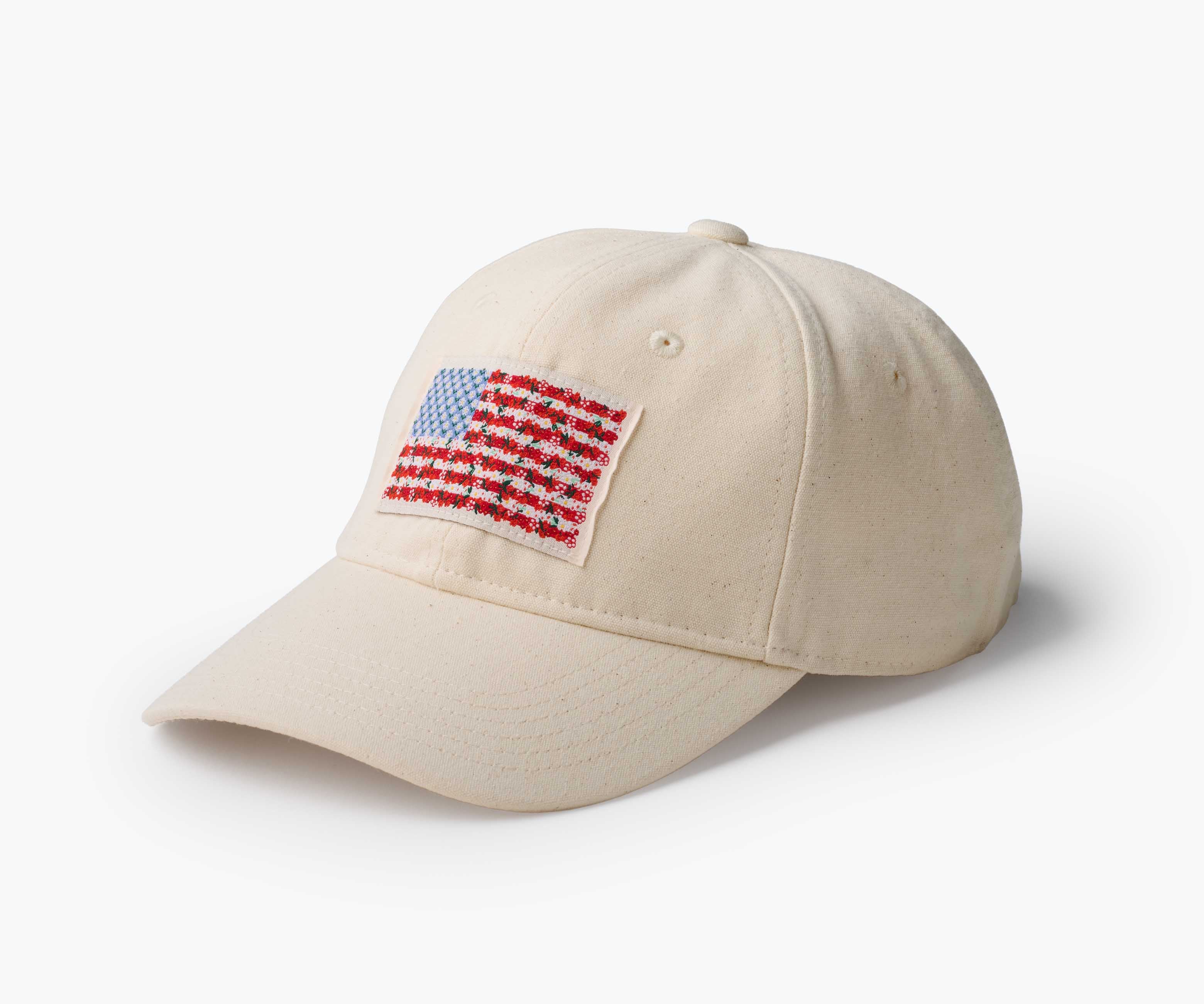 Beige cap with American flag patch on a white background